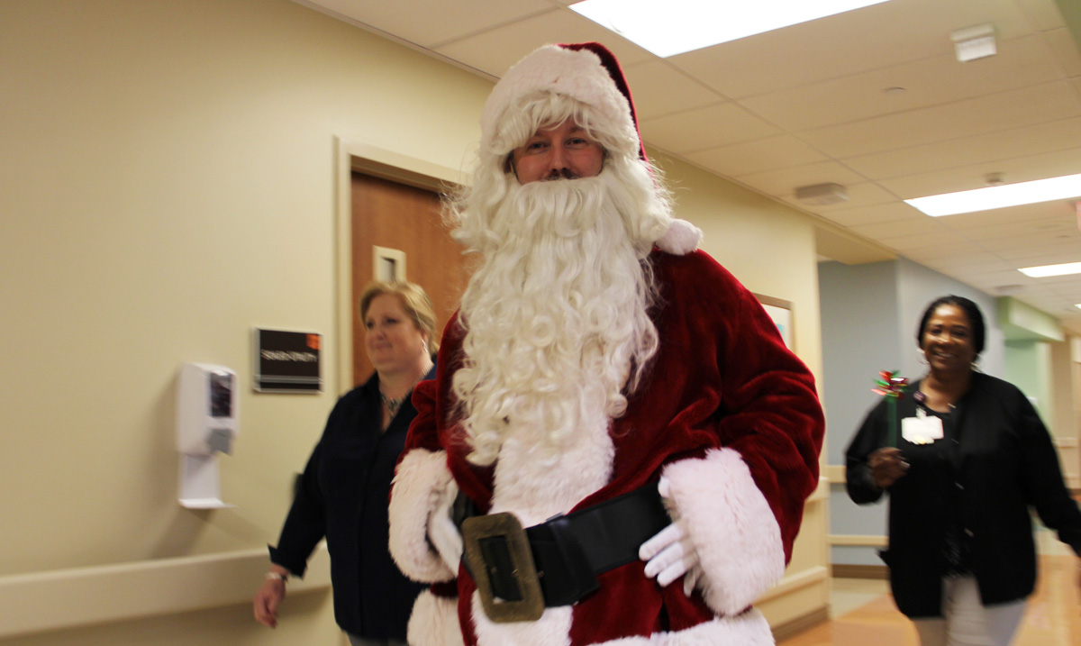 Santa Walking through the Hospital Halls to visit children